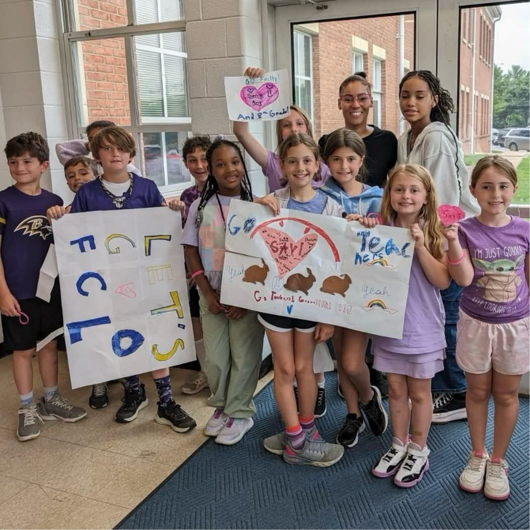 Savi's 3rd grade classmates at STJES volleyball game fundraiser