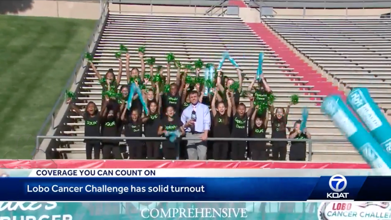 Participants, volunteers and the people cheering them on