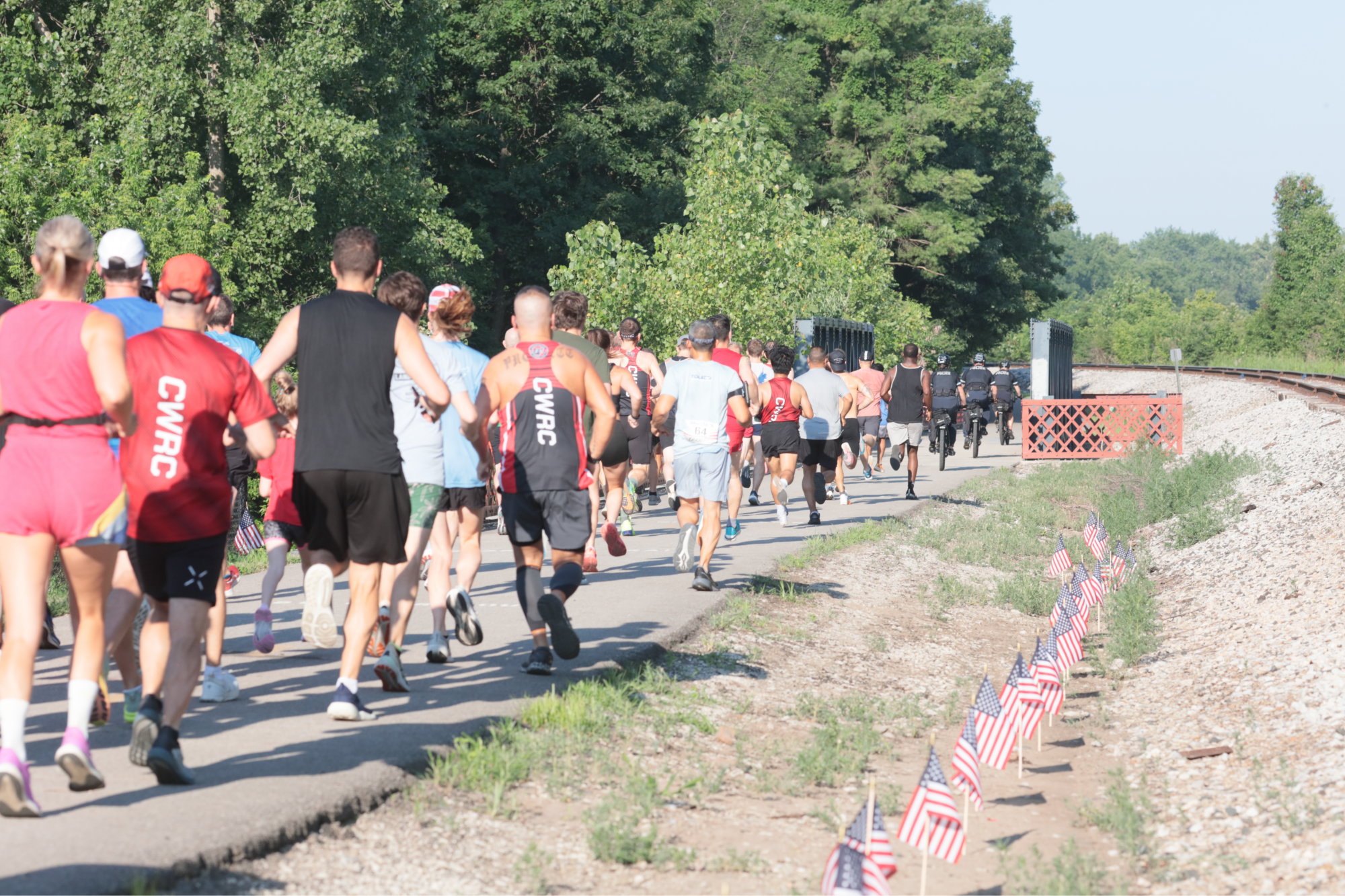 A start line area photo with runners beginning their Hilltop U.S.A. 5K!