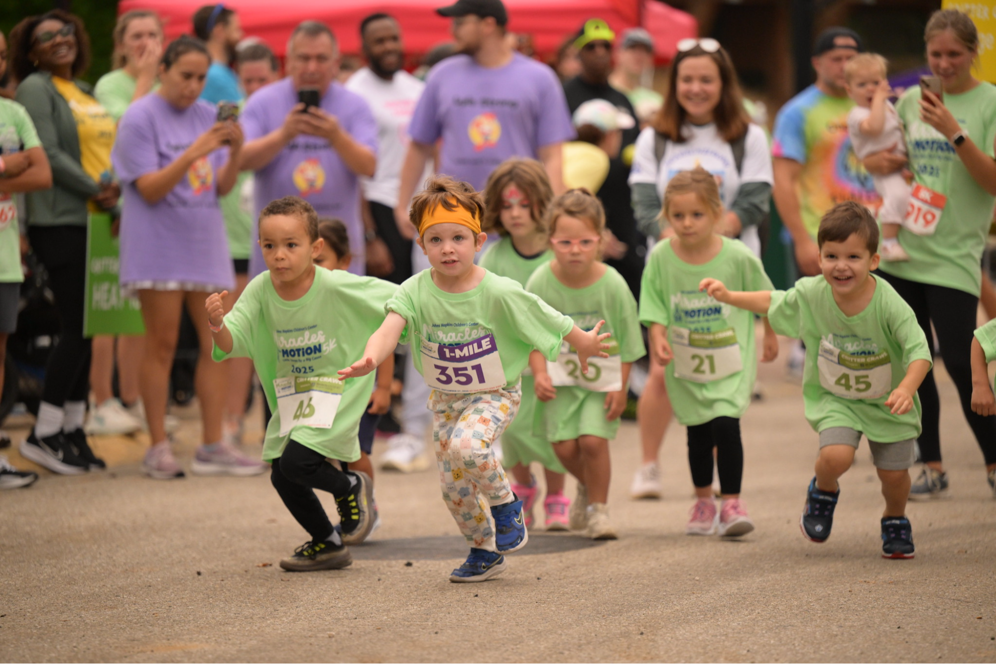 Kids running in the critter crawl kids dash