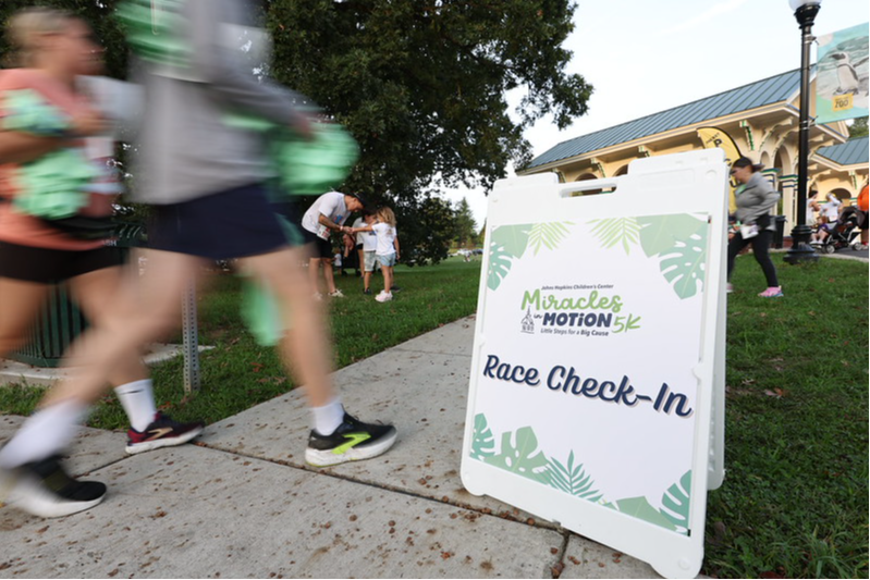 Miracles in Motion Race Check-in Sign