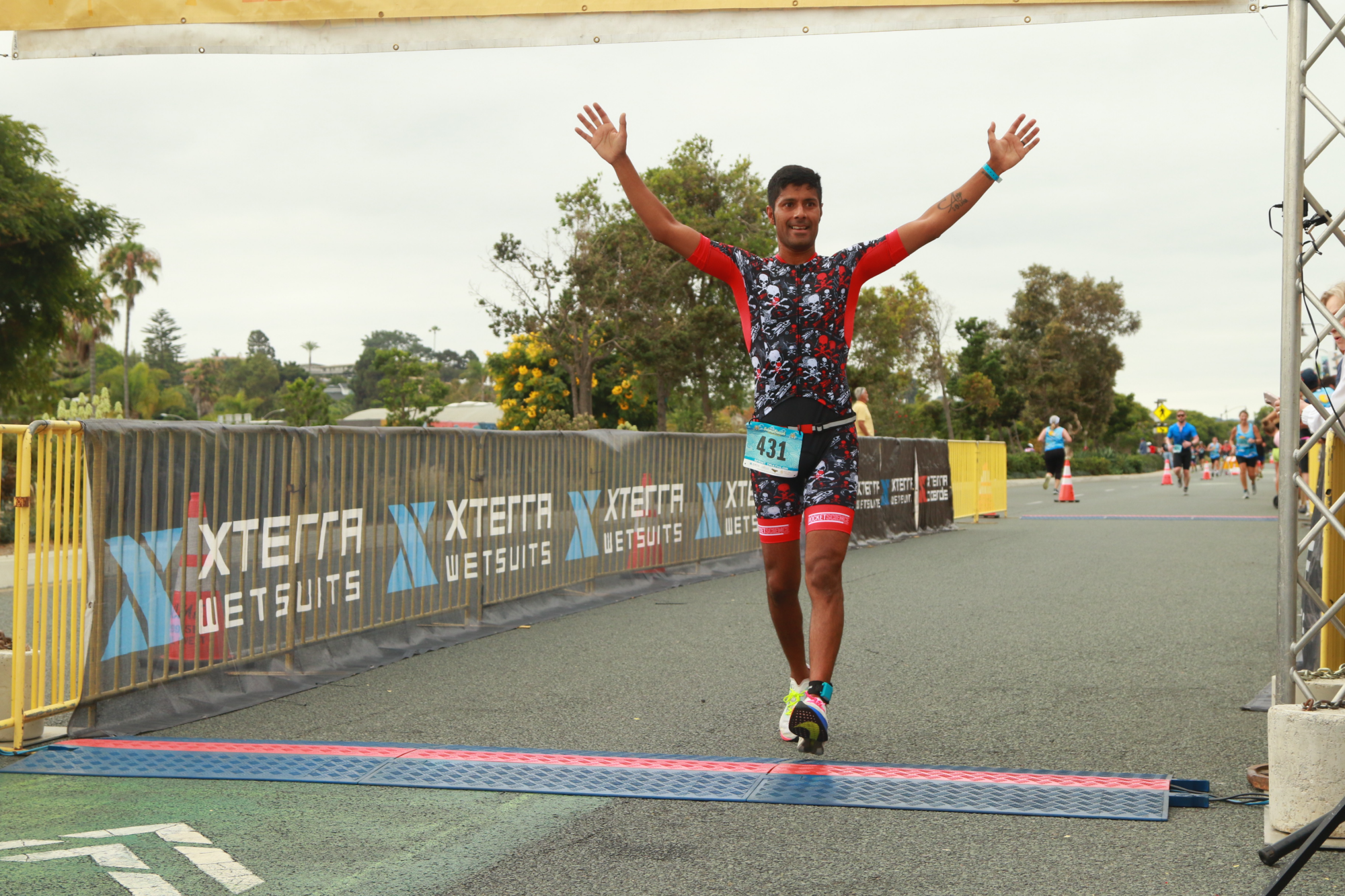 Jumping at solana Beach Triathlon Finish