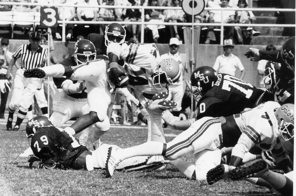 Red Barber behind desk at WRUF mic 1930s