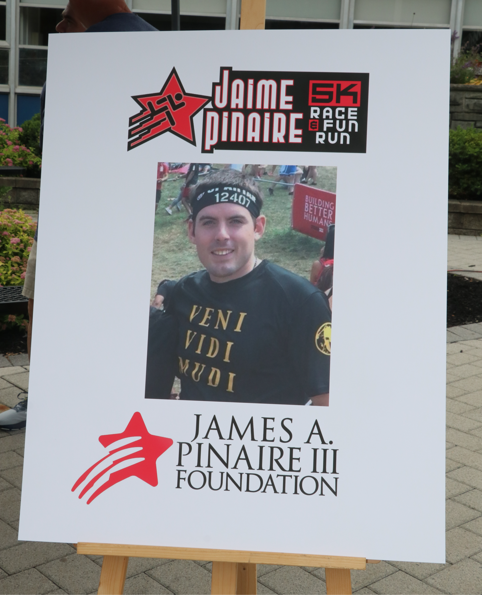 Race poster showing Jaime Pinaire, name of race and James a Pinaire III Foundation name