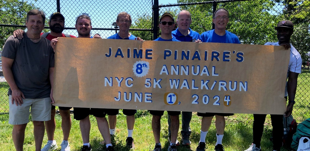 Virtual runners in NYC holding sign