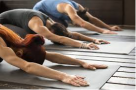 People doing yoga stretches