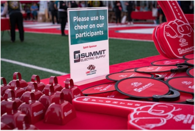 Spirit items on table with Sponsor branding