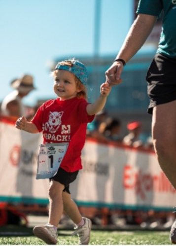 Cub Pack little Challenger holding hands