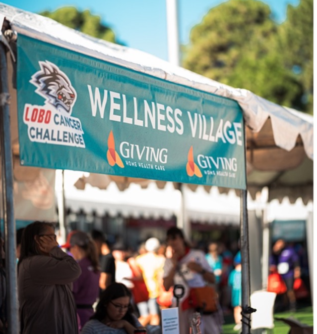 Wellness Village with banner
