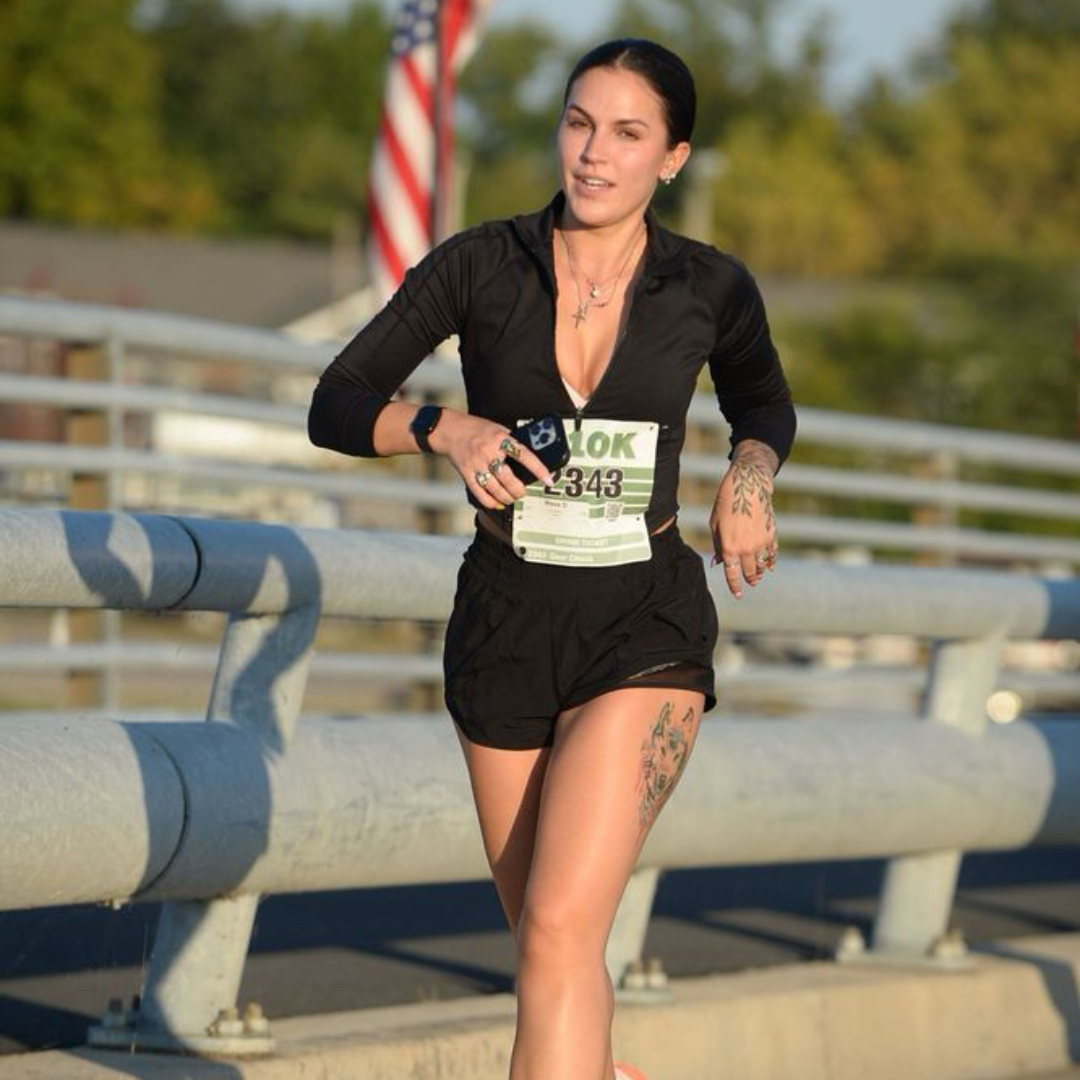 cheyanne running the geist 10k on the bridge
