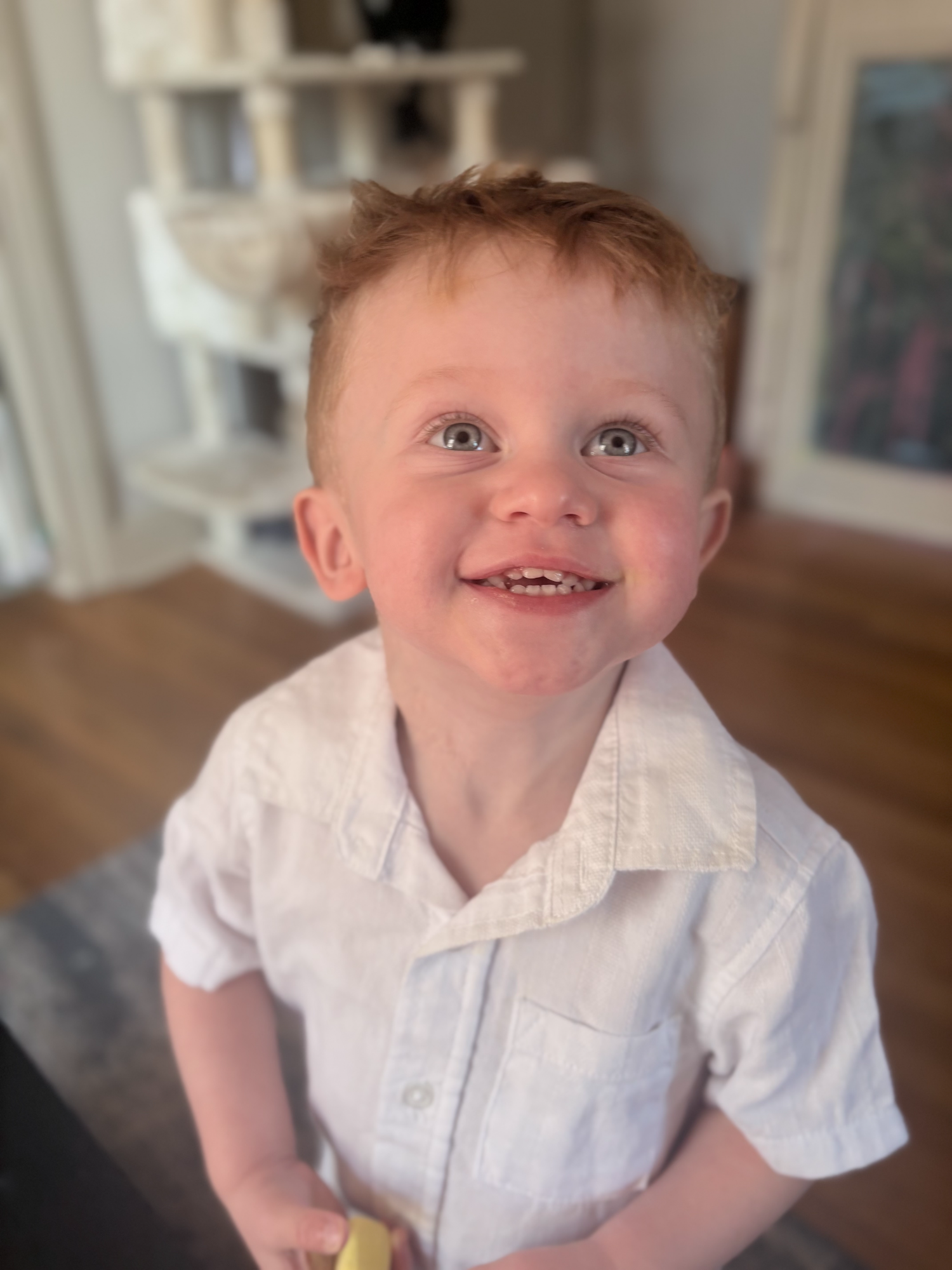 Mikey Lawson wearing a white button up shirt
