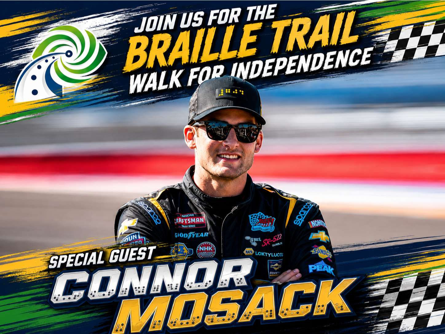 Nascar Driver Connor Mosack in his uniform smiling at camera