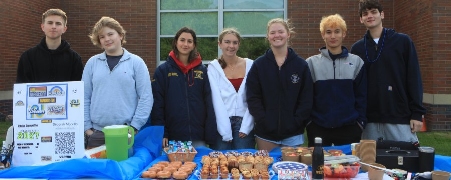 Weston 5K student volunteers at the race day table