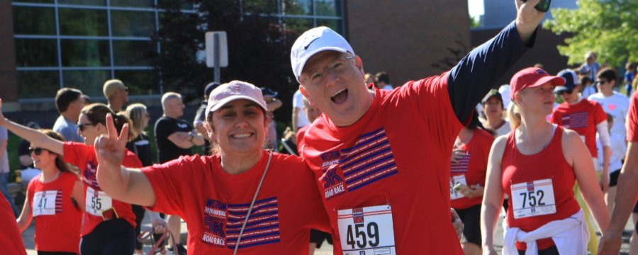 Runners celebrating at the Weston Memorial Day 5K