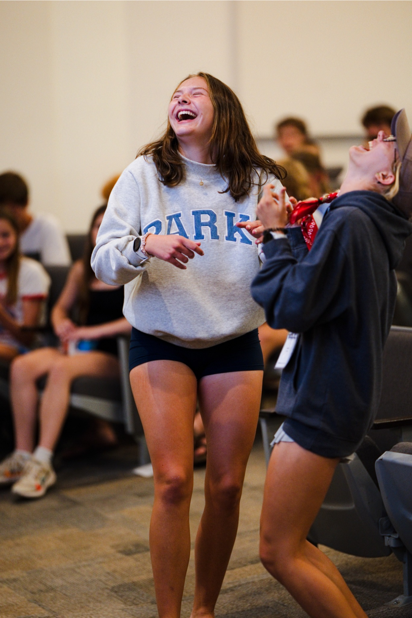 Campers laughing together during a camp activity