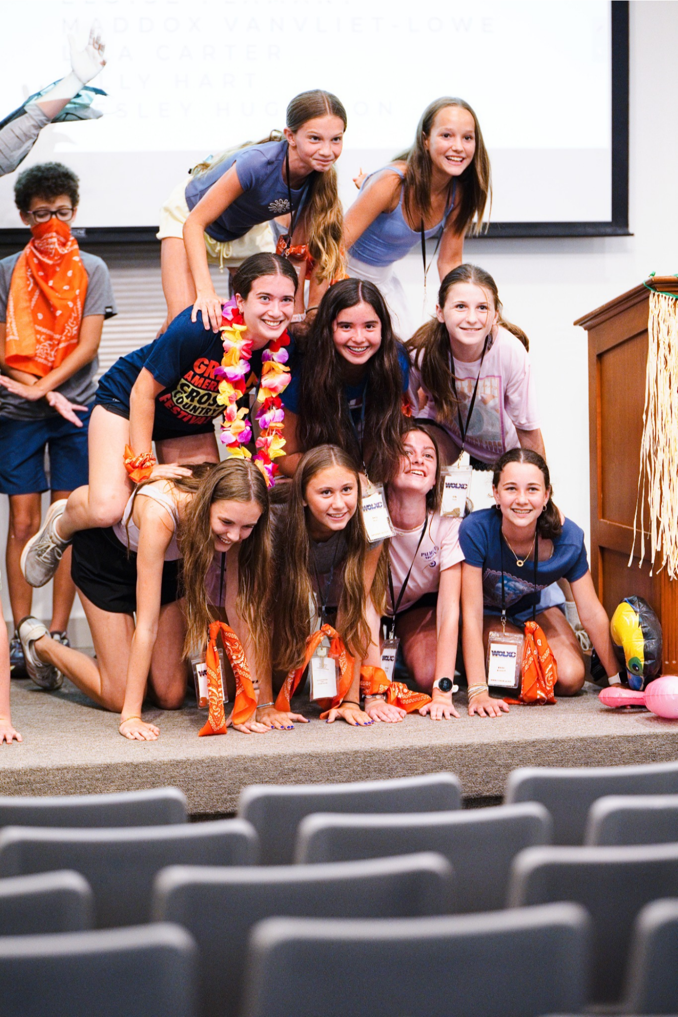 Campers building a team pyramid together