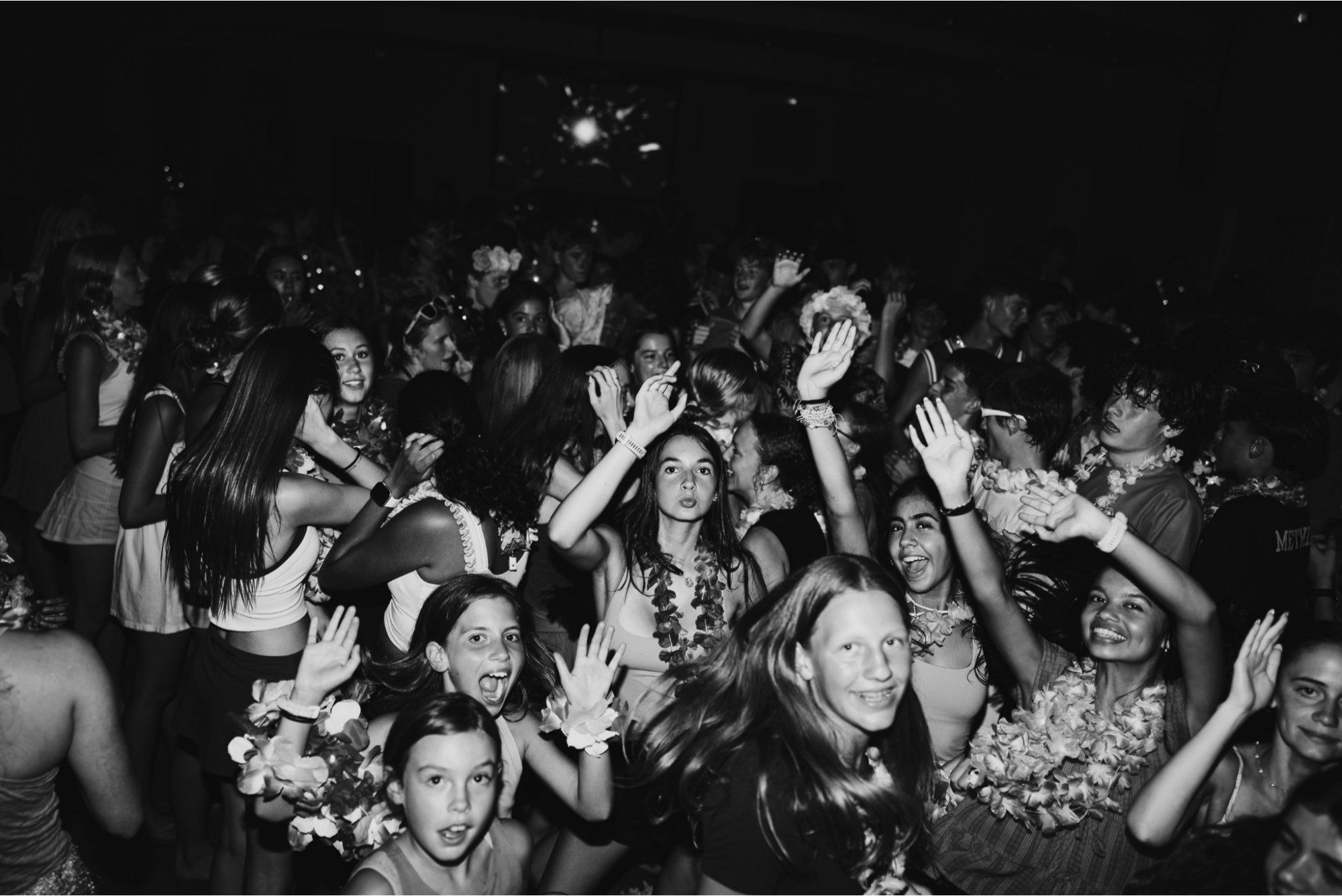 Campers celebrating together at the evening camp dance
