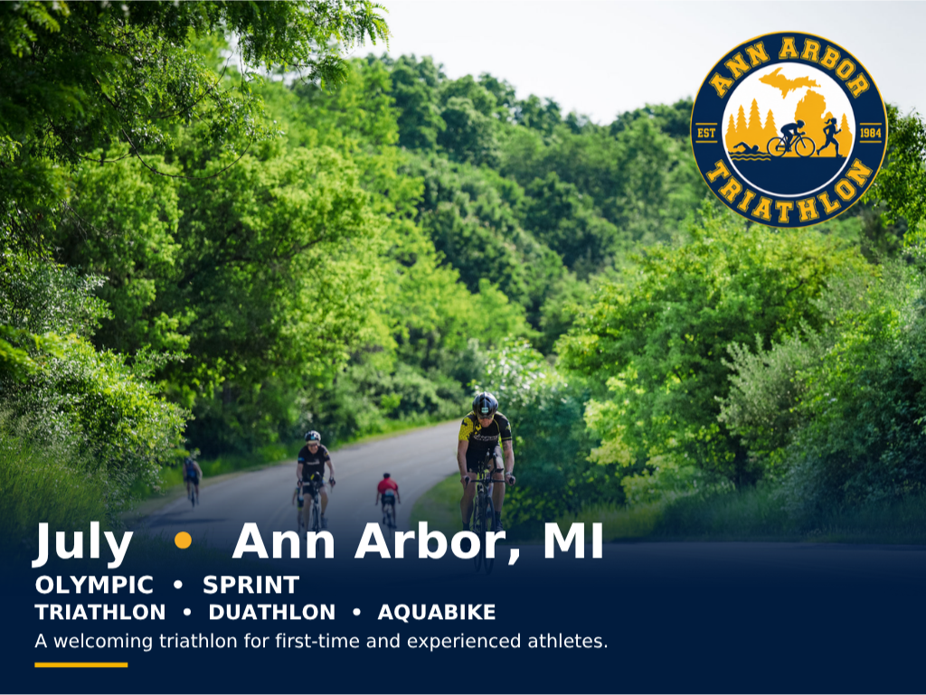 Cyclists riding the scenic roads surrounding Halfmoon Lake in Pinckney, Michigan for the Ann Arbor Triathlon