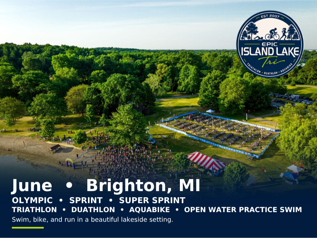 An aerial view of the beach at Kent Lake with hundreds of athletes preparing for the Island Lake Triathlon in Brighton, Michigan