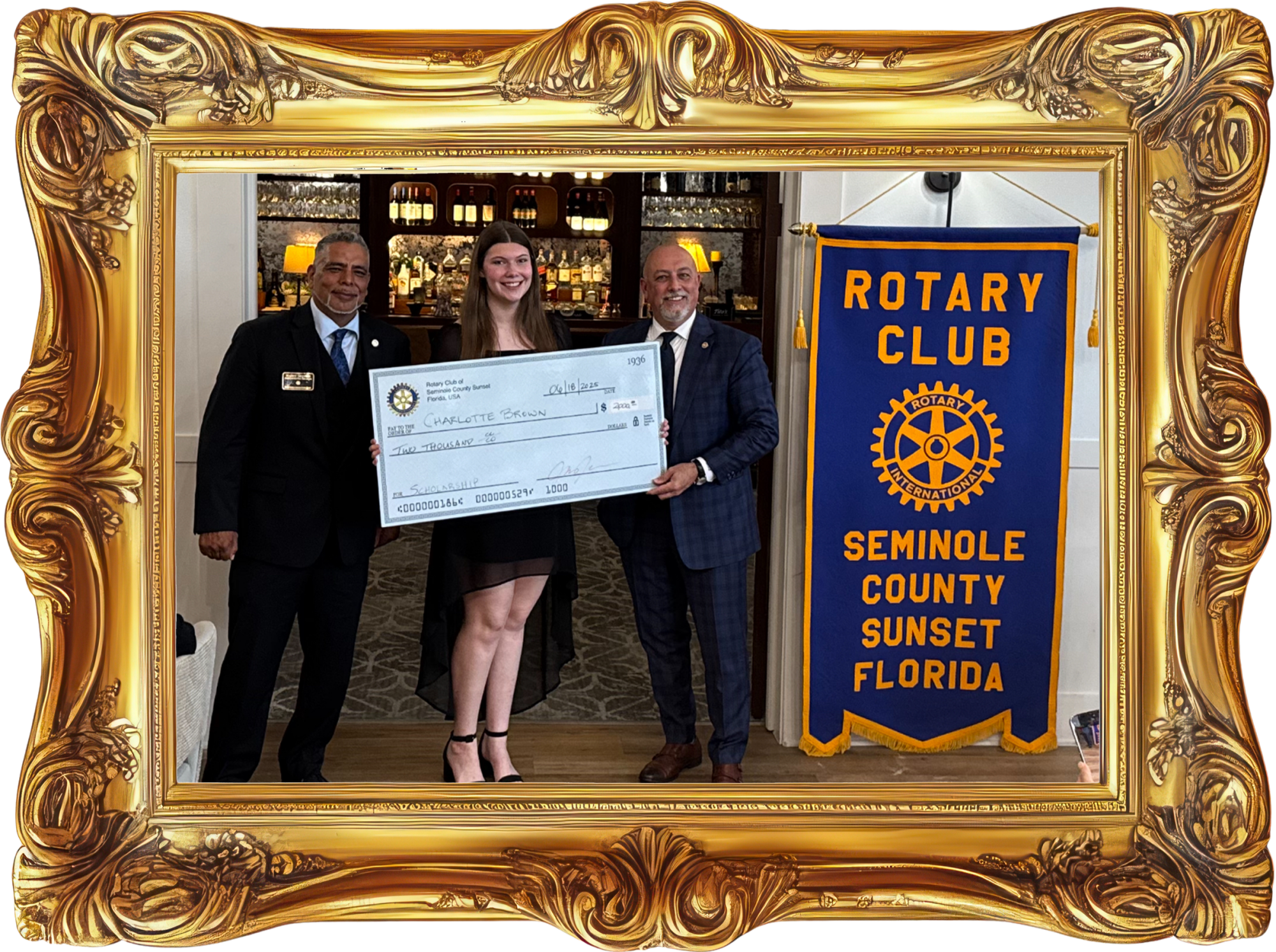 A Rotary Club of Seminole County Sunset scholarship recipient receiving her award