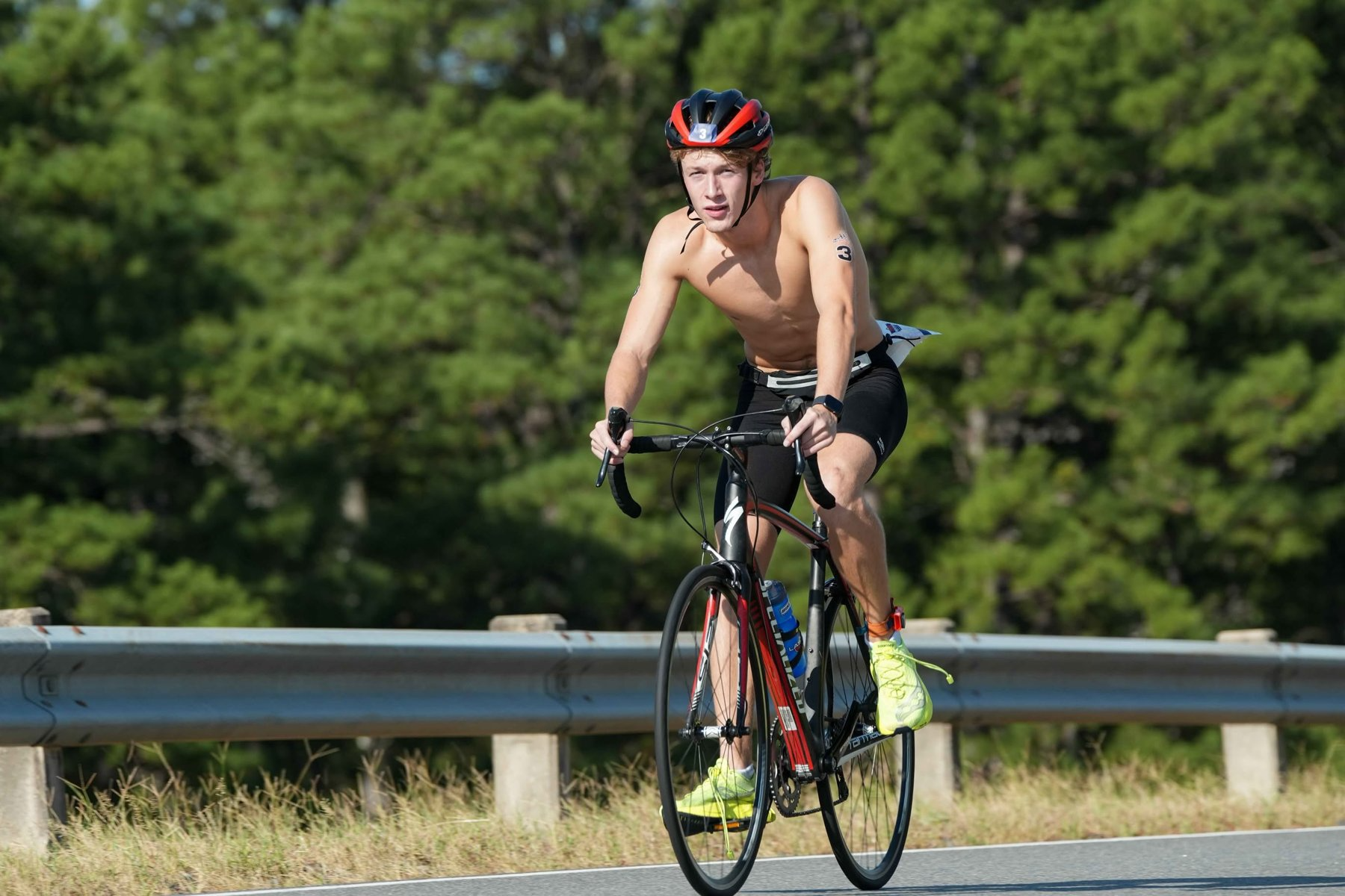 Cyclist riding the bike course at the DeGray Lake Triathlon